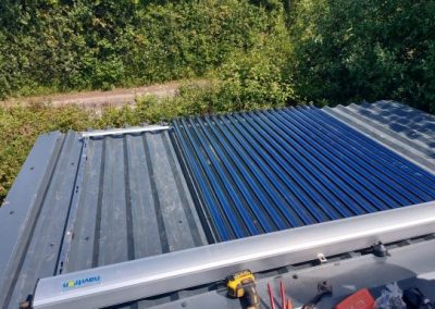 Photo of a Solar Thermal Installation inc Air Source Heat Pump Devon